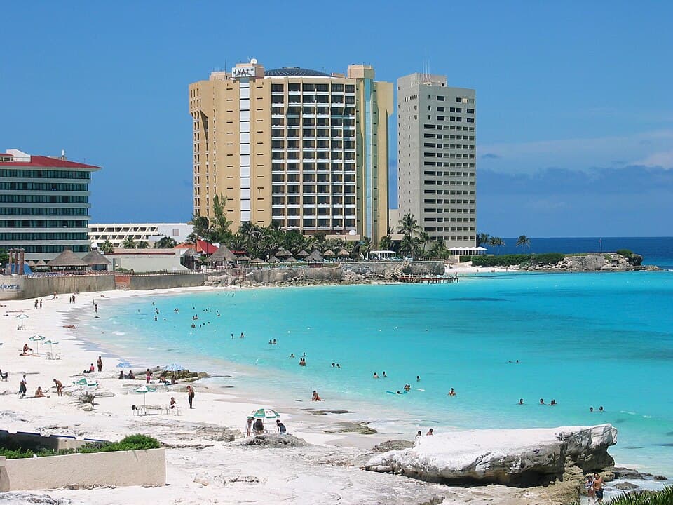 Cancún cityscape in travel-desk light